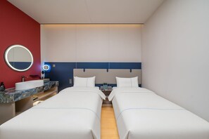 Habitación básica doble | Minibar con artículos gratuitos, wifi gratis, ropa de cama