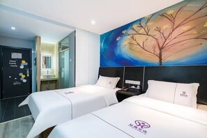 Habitación básica doble | Minibar con artículos gratuitos, wifi gratis, ropa de cama