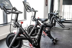 Stay active with our state-of-the-art fitness center, featuring digital exercise bikes with interactive displays.