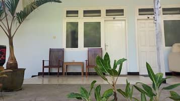 Habitación doble estándar, balcón, vista al jardín | Terraza o patio