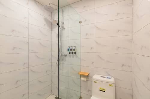 Shower, free toiletries, hair dryer, slippers