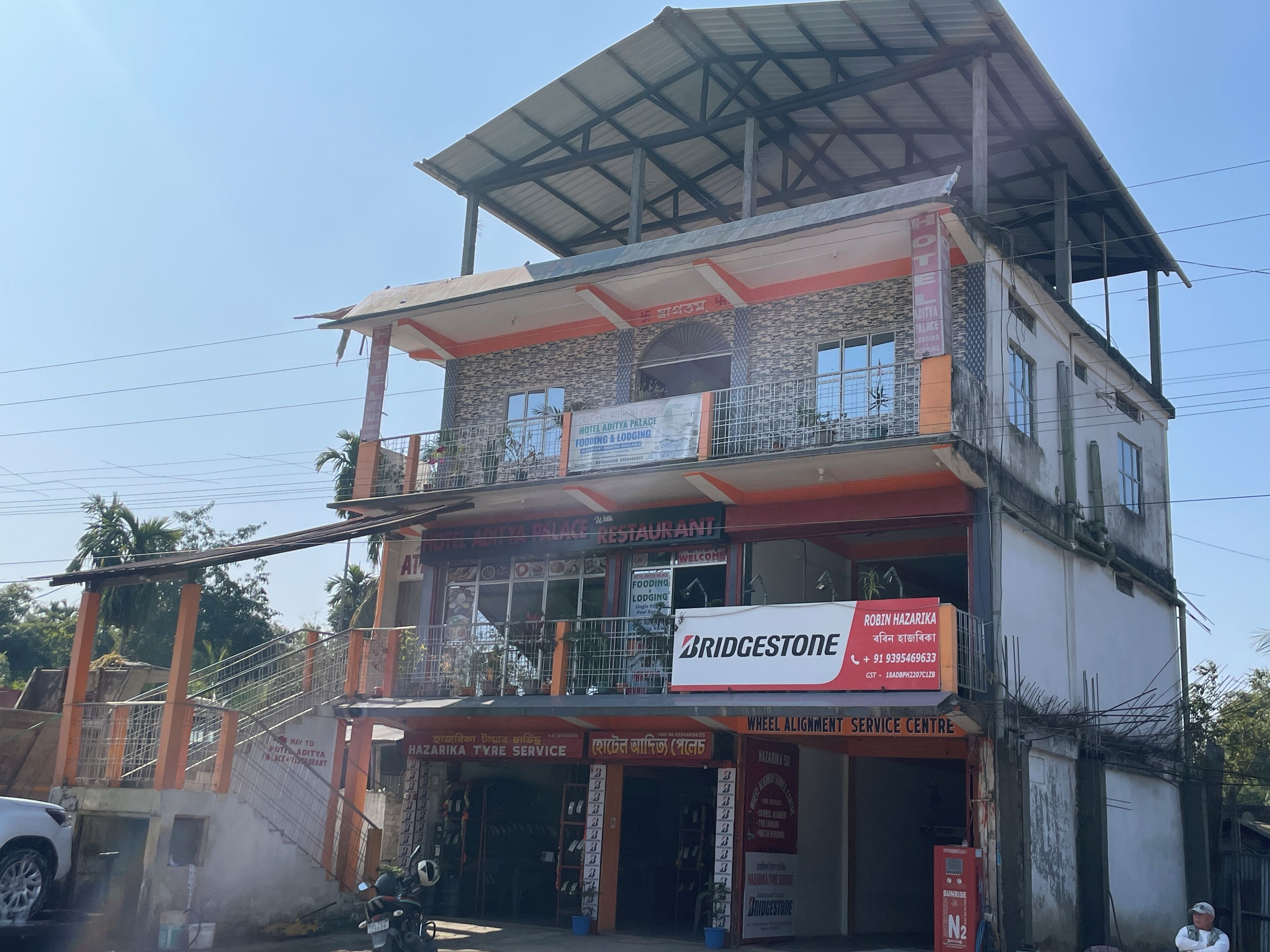 A multi-story building with a restaurant on the ground floor and a hotel on the upper floors.