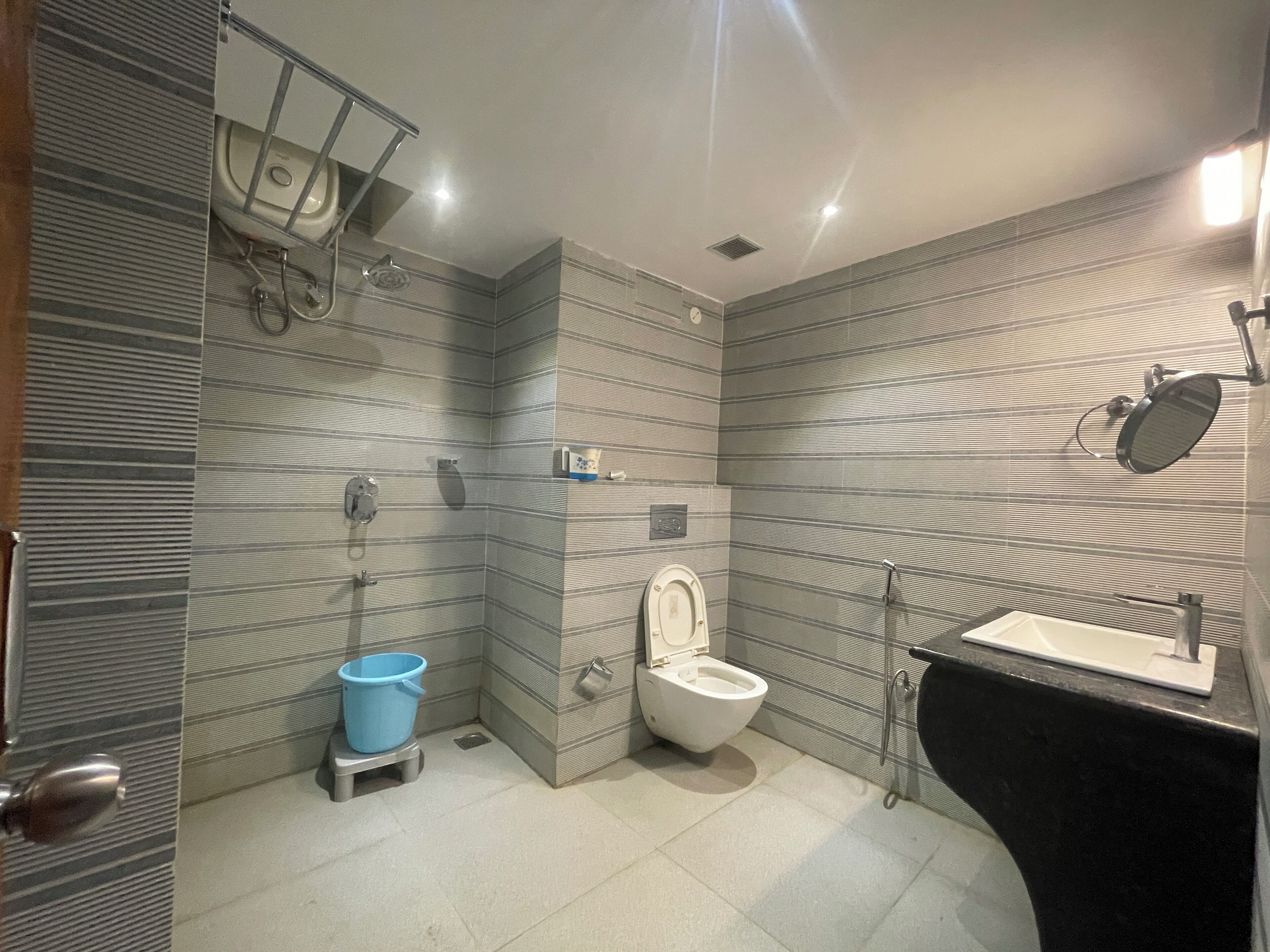 Shower, towels, soap, toilet paper