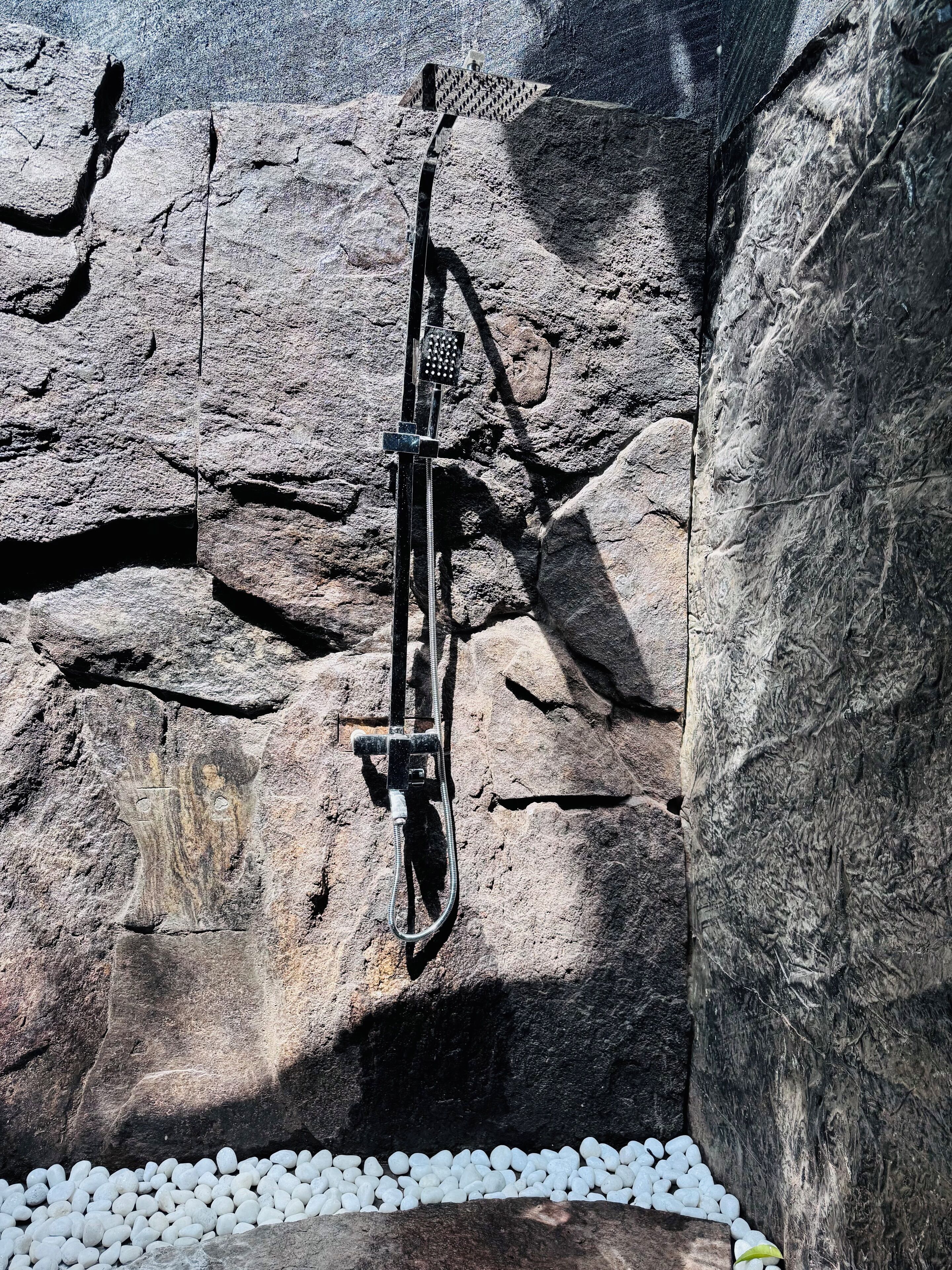 A rock climbing route with a fixed rope and a belay station.