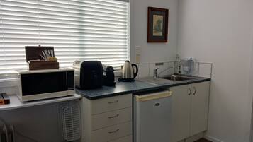 Fridge, microwave, coffee/tea maker, electric kettle
