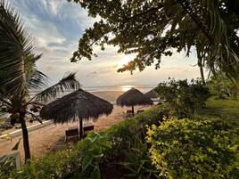 On the beach, sun loungers, beach umbrellas, beach towels