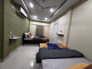 Triple Room, Balcony, Garden View | Free WiFi - The Gulmohar Inn (Guwahati)