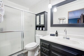 Shower, hair dryer, towels, soap