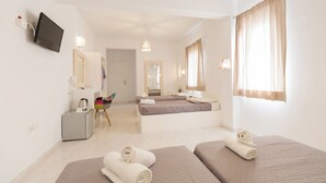 Comfort Quadruple Room, Patio | In-room safe, WiFi (free) - Blue Island Hotel (Santorini)