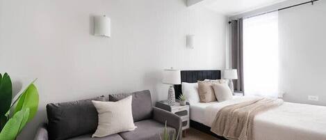 1 غرفة نوم ومكواة/لوح كي وواي فاي مجانًا وملاءات أسرّة