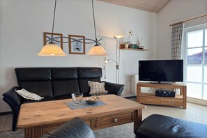 Een smart-tv en een open haard