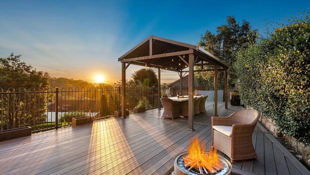 A wooden deck with a fire pit, outdoor furniture, and a pergola. - "Salt & Serenity" – close to Beach & Shops (Terrigal)