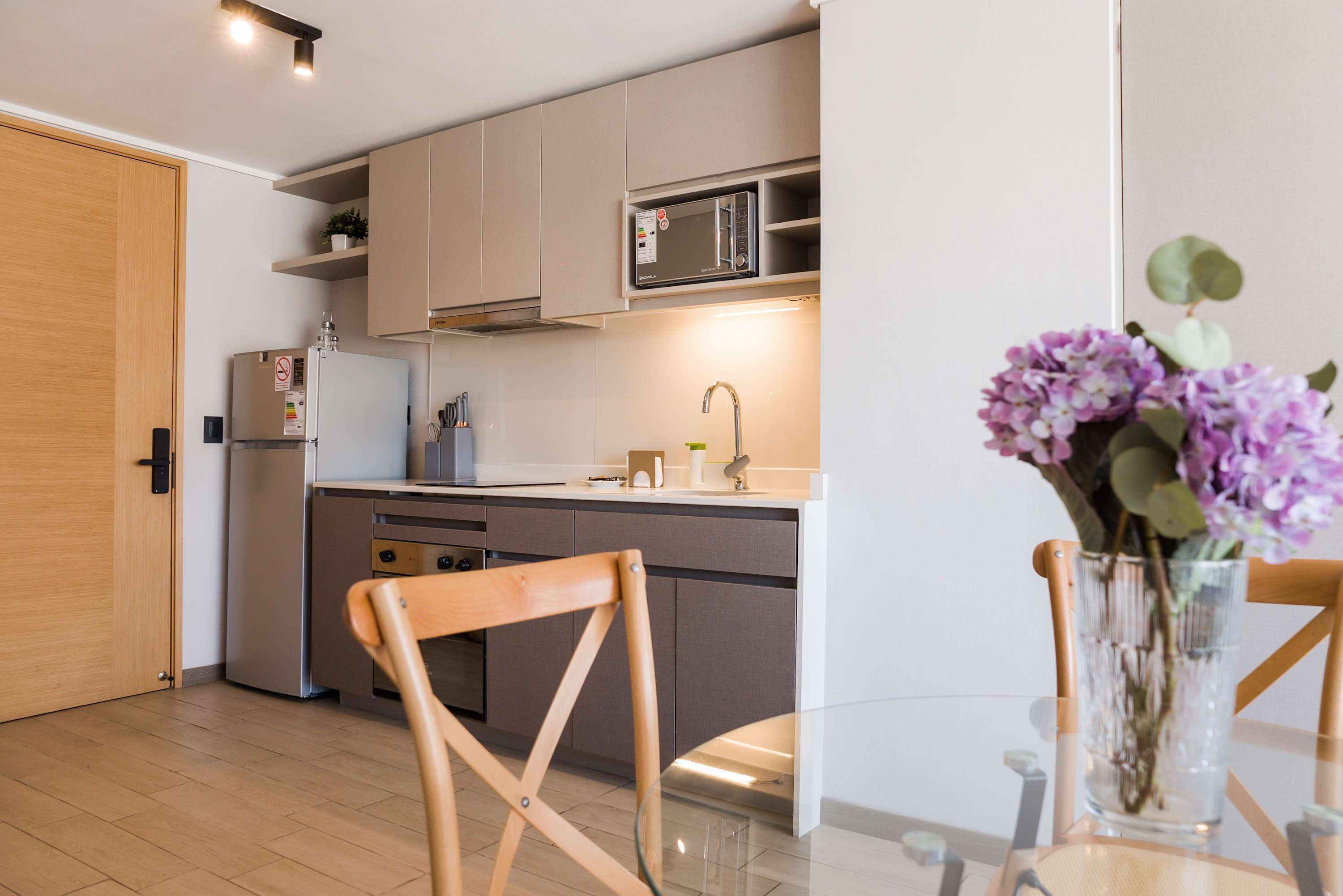 Coffee/tea maker, fridge, microwave, oven