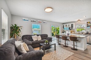 House, Multiple Beds, Pool Access, Garden View (The Tampa Oasis) | Living area | 42-inch flat-screen TV with digital channels - The Tampa Oasis (Tampa)