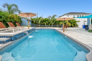 Outdoor pool, pool umbrellas, pool loungers