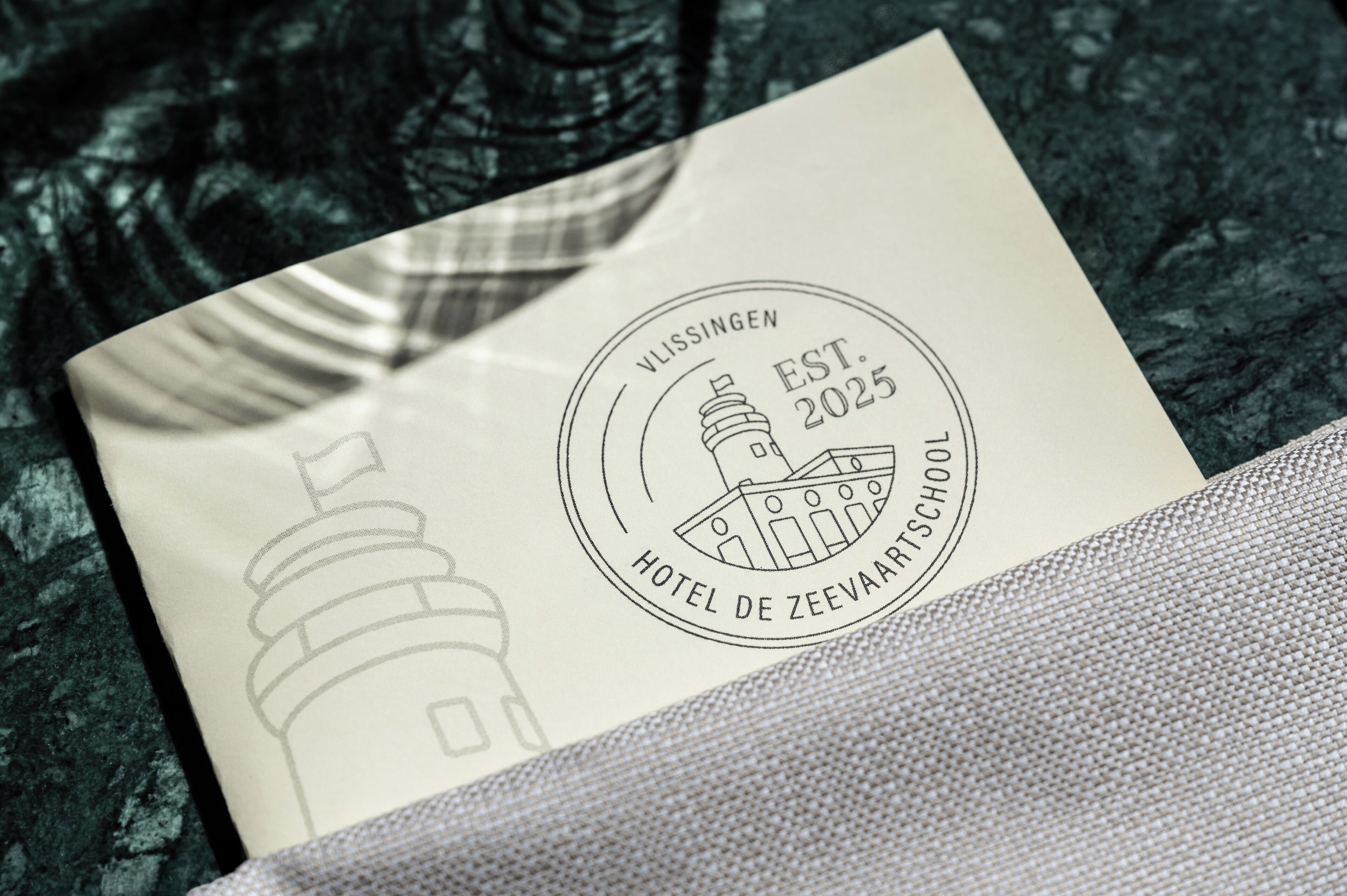 A hotel brochure with a logo and establishment year.