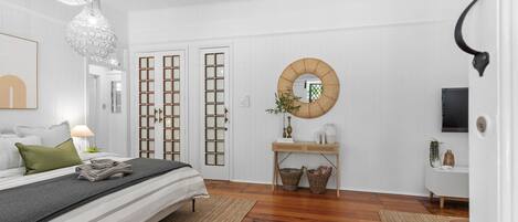 1 bedroom, desk, iron/ironing board, travel crib