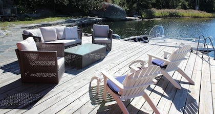 Flott Hus ved sjøen Brygge Båt Nært Kristiansand Aagerøya