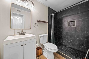 Condo, 1 Queen Bed, Balcony (The Urban Oasis) | Bathroom | Shower, hair dryer, towels