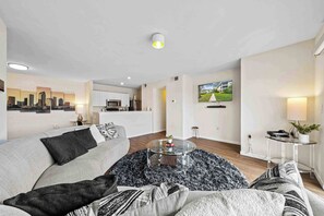 Condo, 1 Queen Bed, Balcony (The Urban Oasis) | Living area