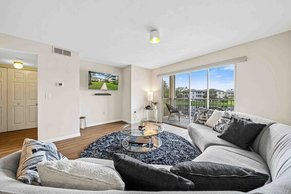 Condo, 1 Queen Bed, Balcony (The Urban Oasis) | Living area | 42-inch flat-screen TV with digital channels