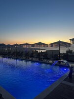 Indoor pool, seasonal outdoor pool, pool umbrellas, sun loungers