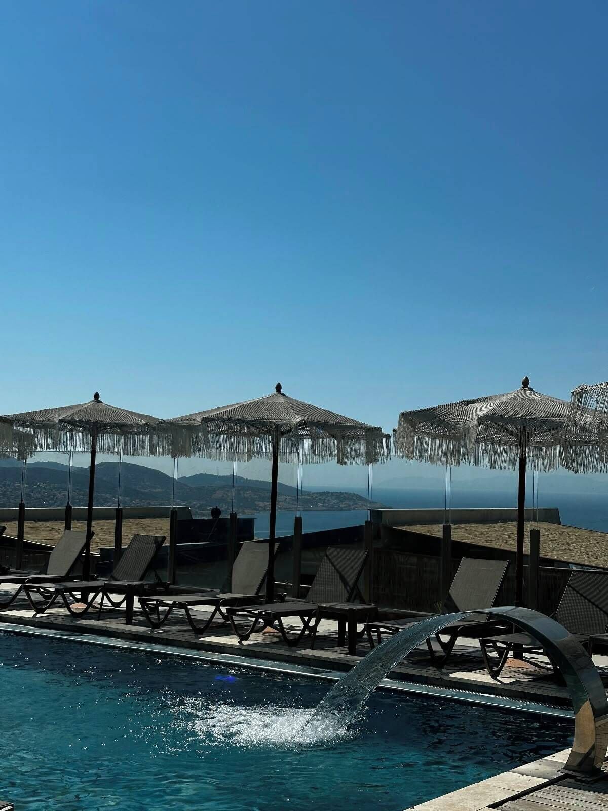 Indoor pool, seasonal outdoor pool, pool umbrellas, pool loungers