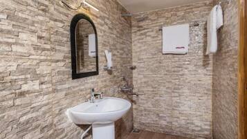 Shower, free toiletries, towels, soap