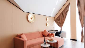 Luxury Room | Living area | 43-cm Smart TV with cable channels