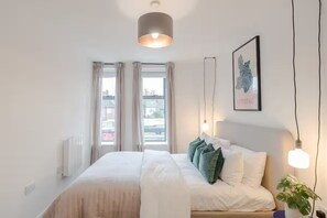 1 slaapkamer, een strijkplank/strijkijzer, wifi, beddengoed