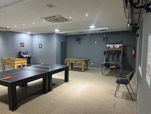 Apartamento conforto | Sala de jogos