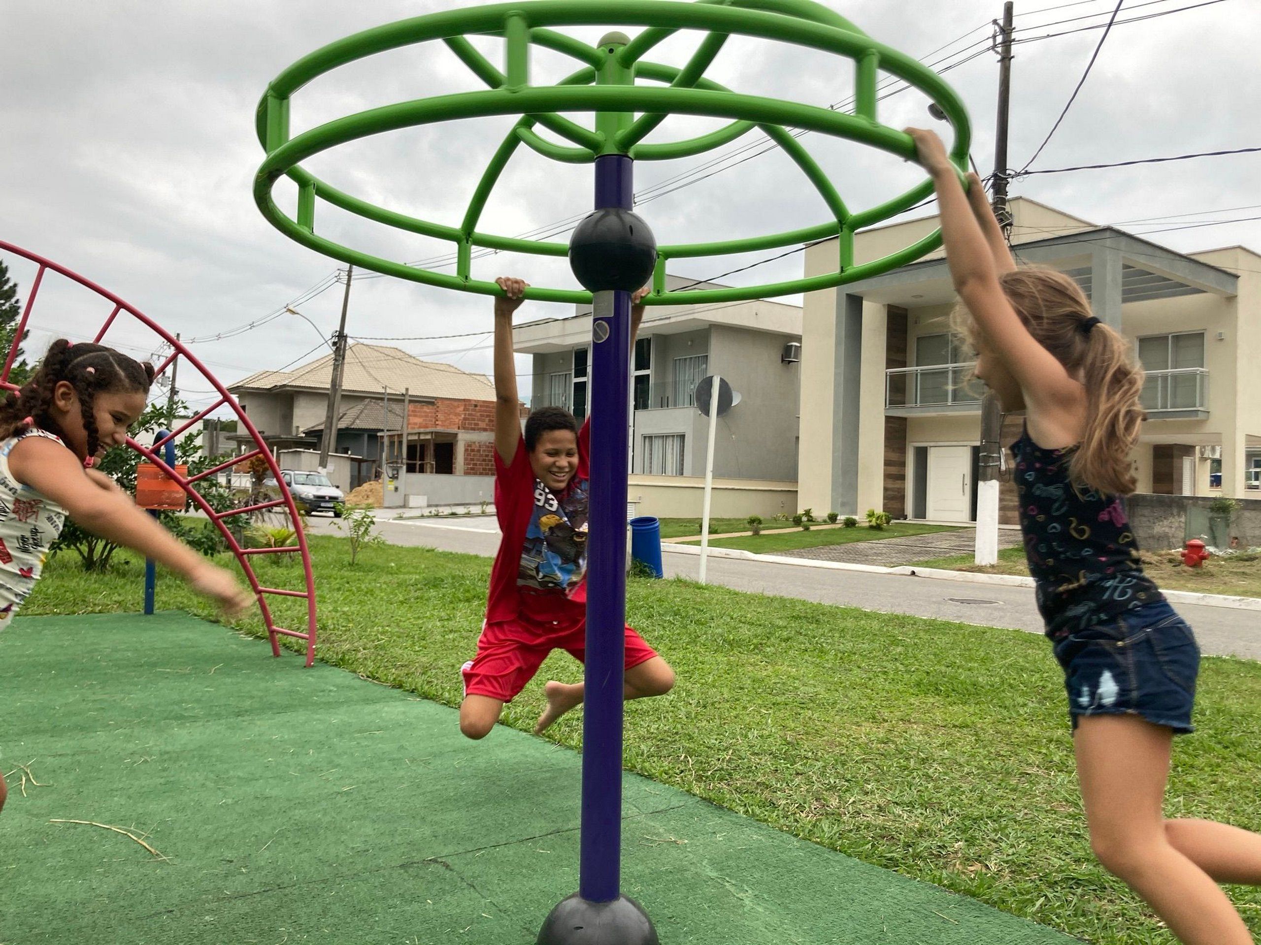 Children playing on playground equipment.