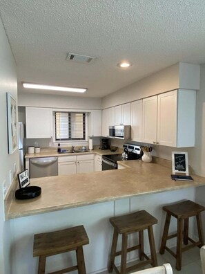 Condo, 1 Bedroom | Private kitchen | Fridge, coffee/tea maker, toaster - Bienvenue 1 Bedroom Condo (Navarre)