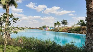 Outdoor pool - Modern 3BR townhouse in Damac Hills 2 (Madinat Zayed)