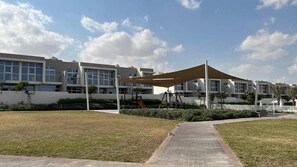 Exterior - Modern 3BR townhouse in Damac Hills 2 (Madinat Zayed)