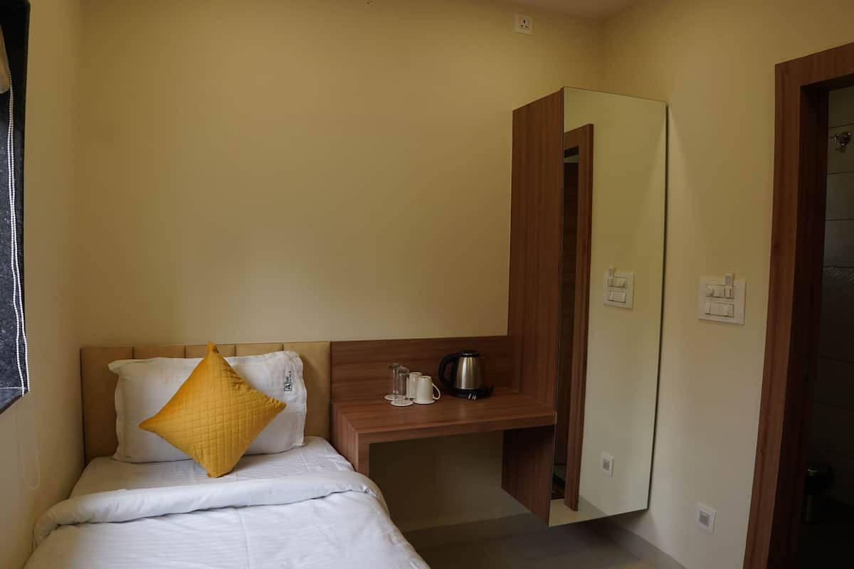 Habitación individual Deluxe, vistas a la ciudad | Escritorio, espacio para trabajar con un portátil, wifi gratis