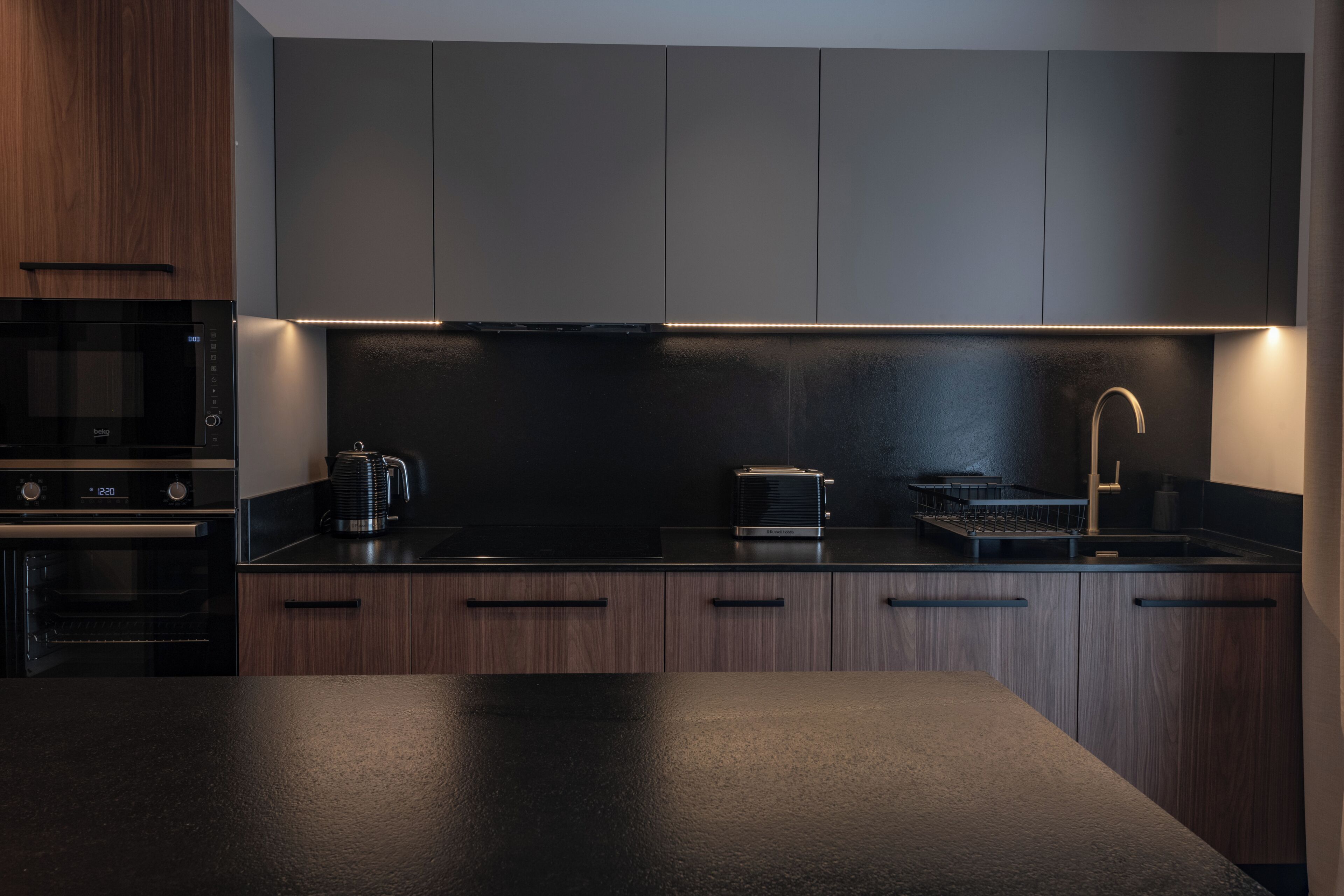 Deluxe Suite, Balcony | Private kitchenette | Full-sized fridge, microwave, oven, stovetop