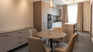 Signature Suite, Balcony | Living area