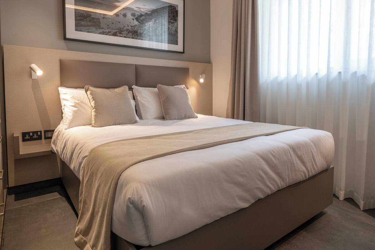 Standard Suite | 1 bedroom, in-room safe, desk, laptop workspace