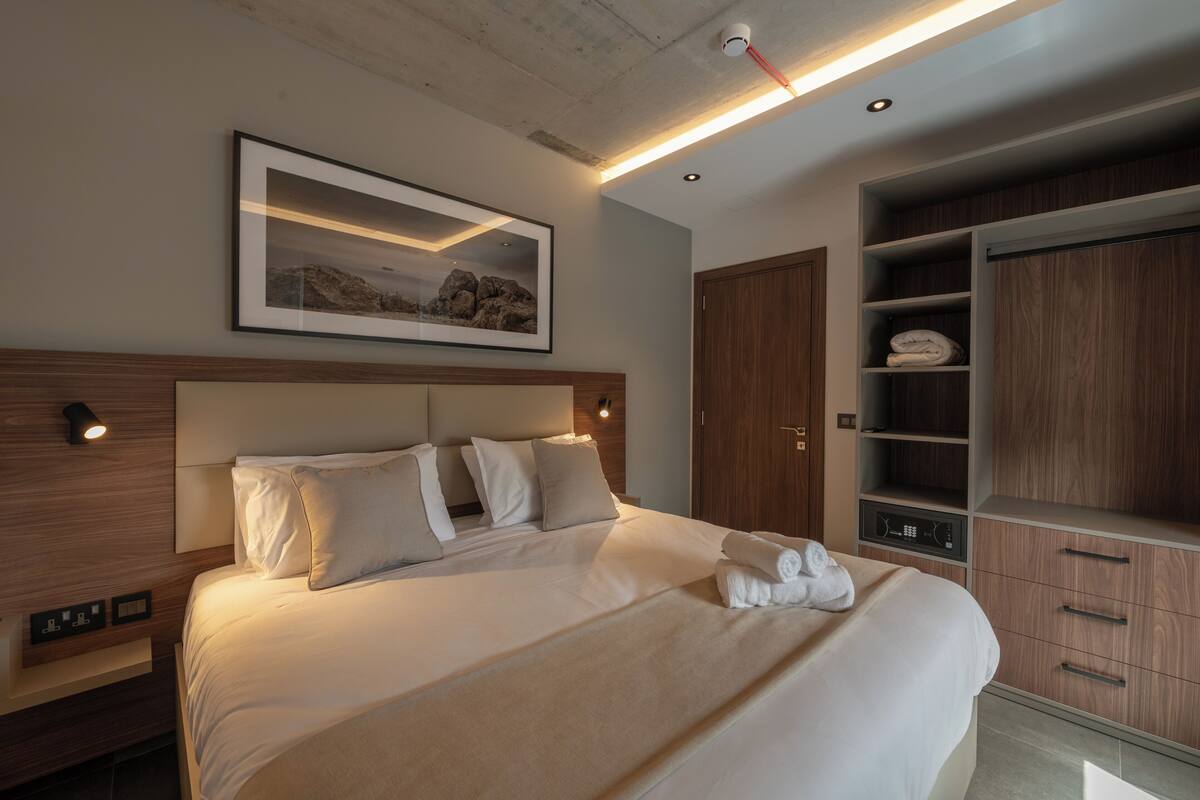 Superior Suite, Balcony | 1 bedroom, in-room safe, desk, laptop workspace