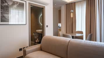 Junior suite, balkon | Woonruimte