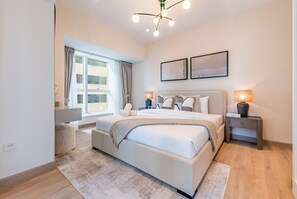2 chambres, coffre-fort, fer et planche à repasser