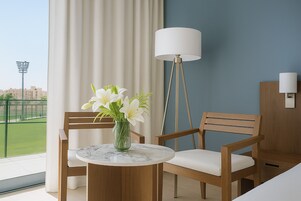 Deluxe Twin Room City View | Living area | Fireplace