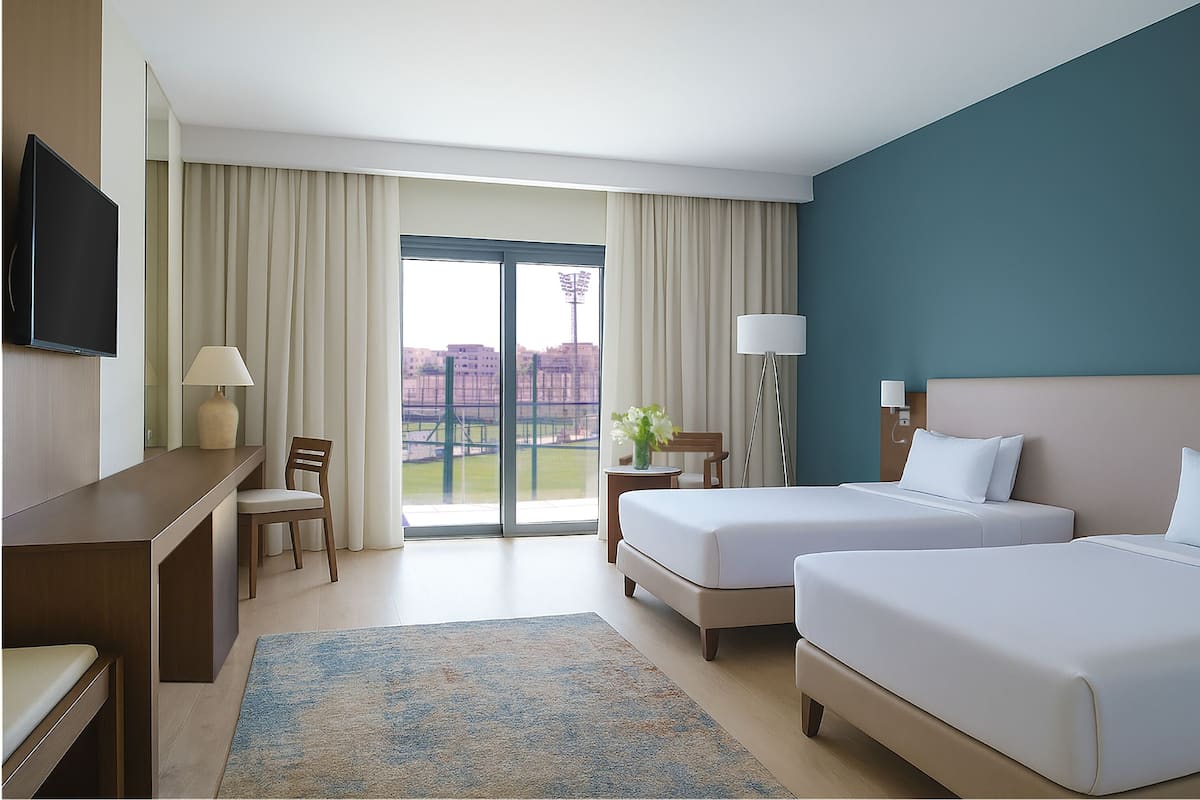 Deluxe Double Room, 2 Twin Beds, Courtyard View | Minibar, in-room safe, desk, rollaway beds