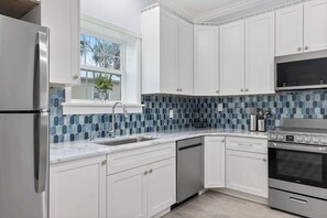 Fridge, microwave, oven, stovetop - Cozy Condo ADA Accessible (Sebastian)