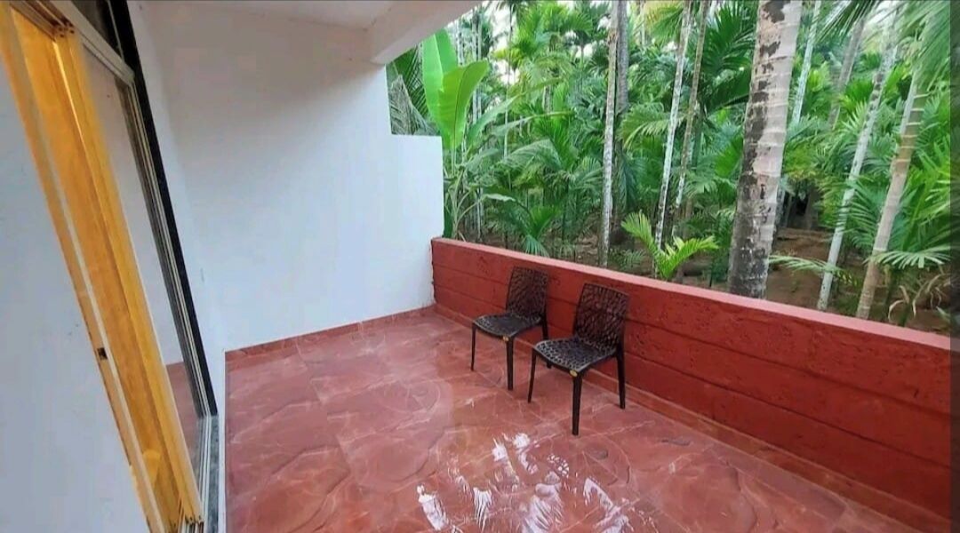 Deluxe Room, Garden View | Terrace/patio