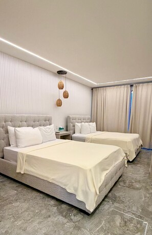 Egyptian cotton sheets, premium bedding, down duvets, pillow-top beds - Caye Caulker Condos By Barefoot (Caye Caulker)