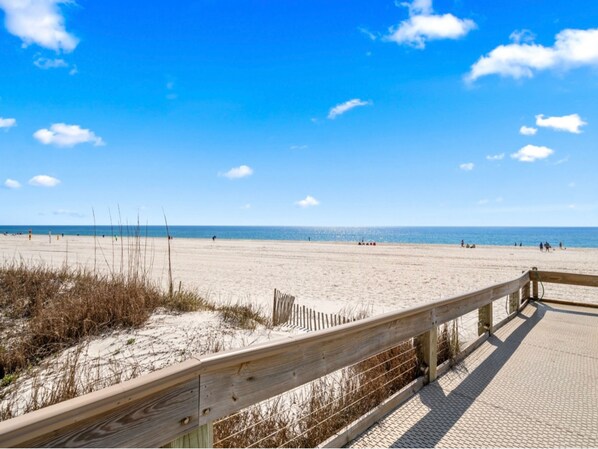 On the beach, sun loungers - Updated Beachfront Condo at Phoenix V. Stunning Gulf Views & Splash Pad Fun! (Orange Beach)