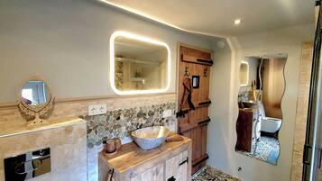 Shower, hair dryer, towels, soap