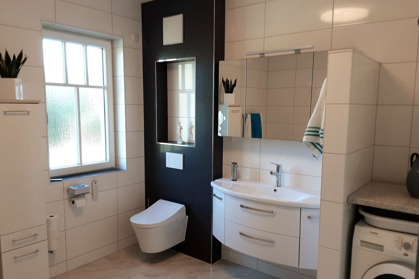 Assecador de cabells i bidet 